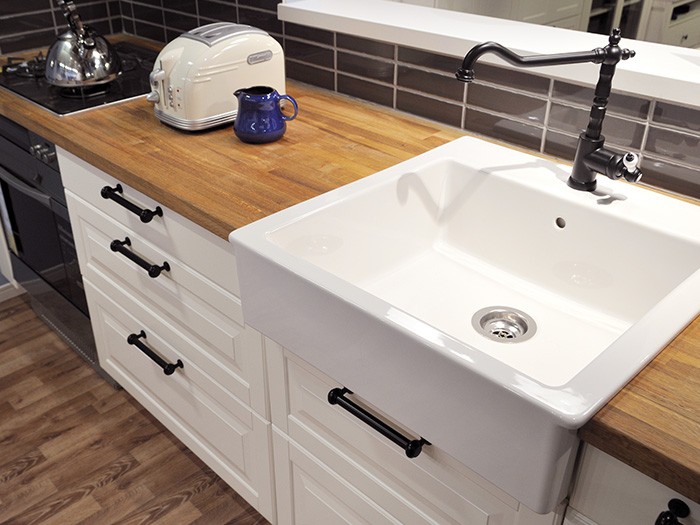 Cast-iron enameled sinks are long-lasting, attractive, and add character